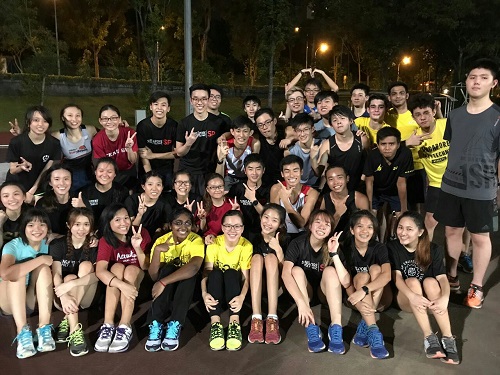 Group photo with Marathon members after training